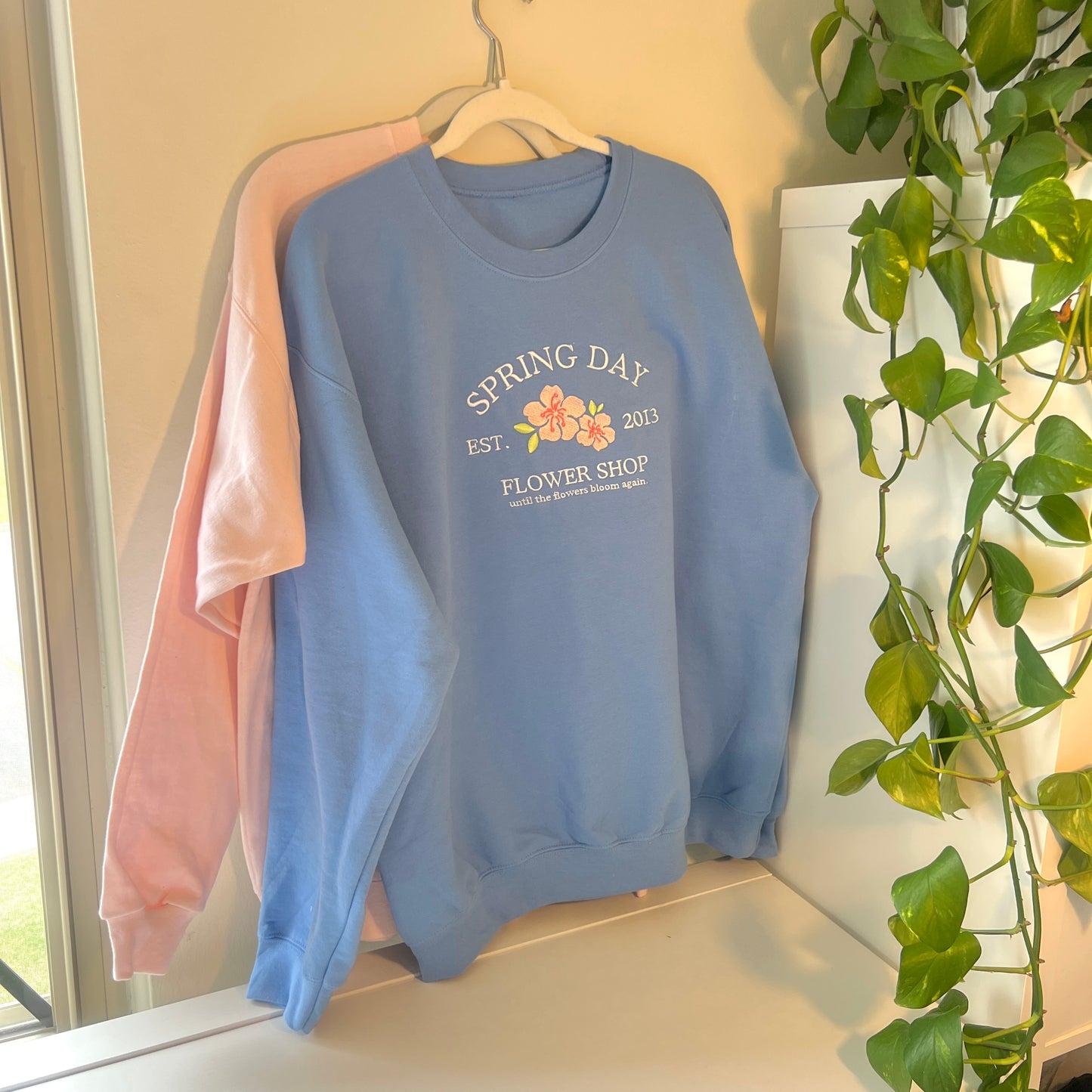 spring day flower shop embroidered crewneck