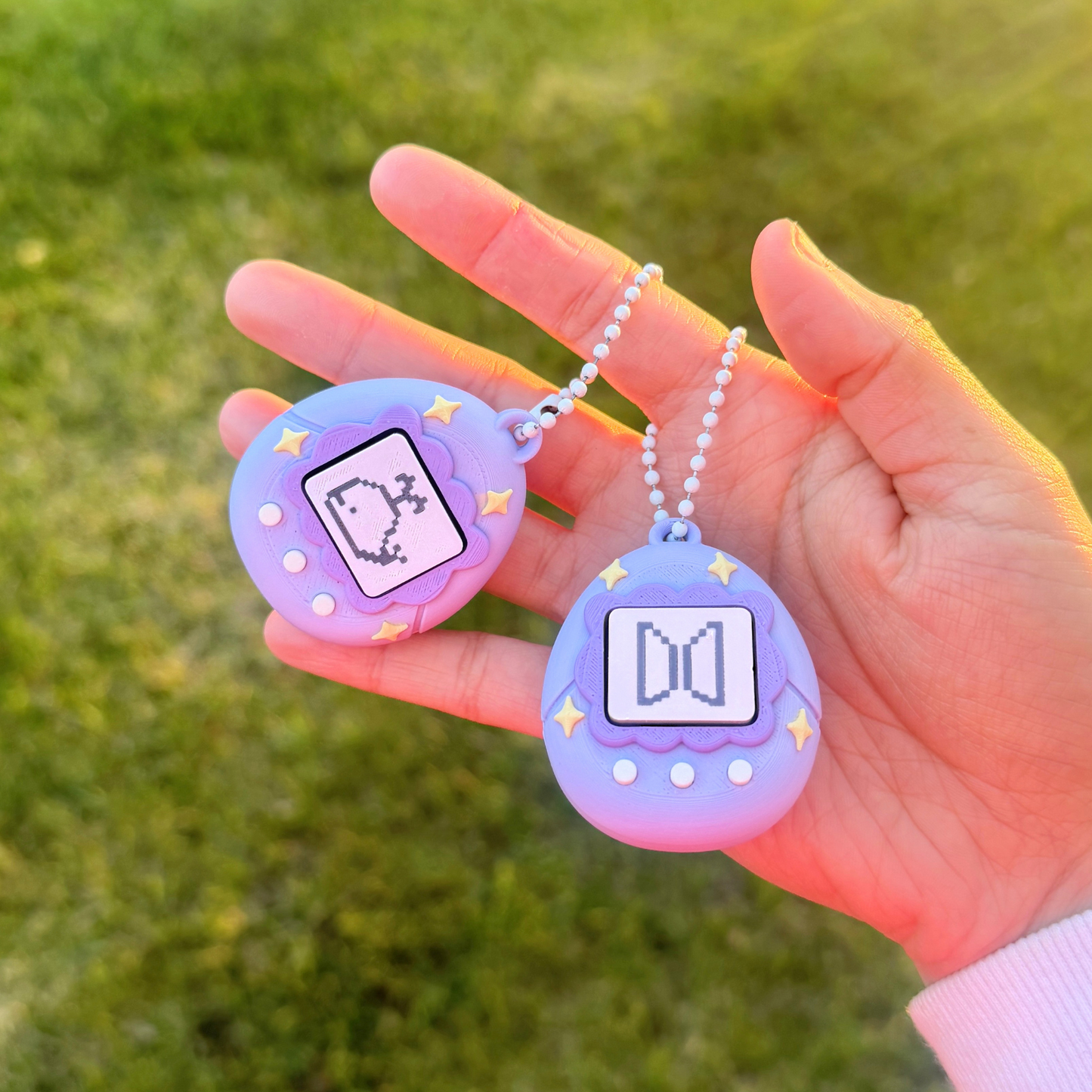 purple tamagotchi fidget clicker keychain