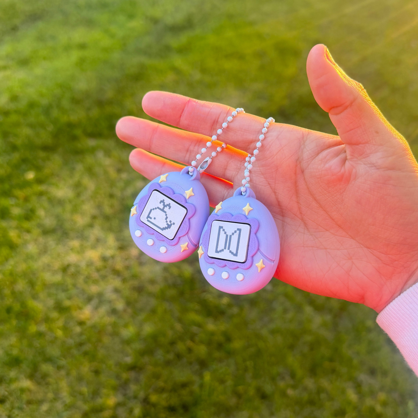 purple tamagotchi fidget clicker keychain